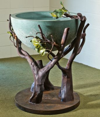 Batismal font with Ornamental iron base fabricated by Cheney Metals
